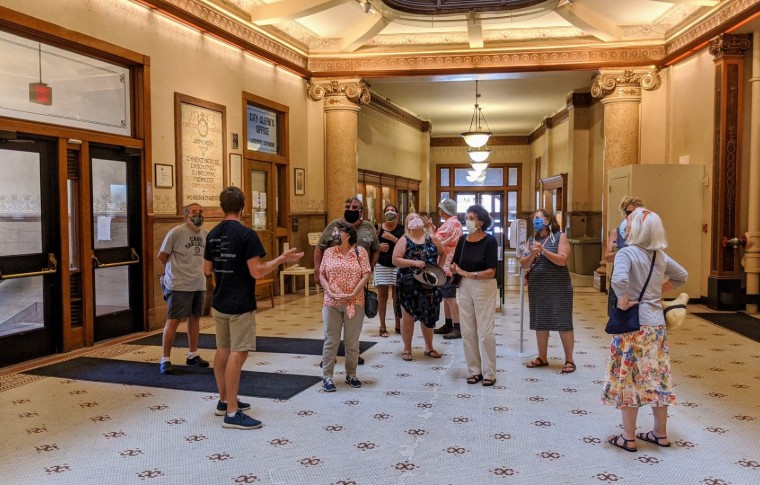 a tour group in city hall Milwaukee